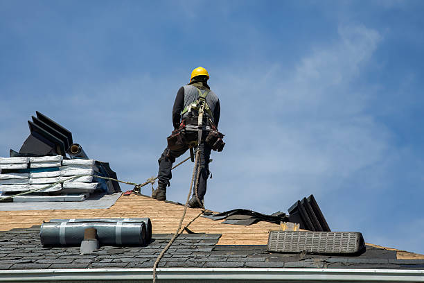 Professional Storm Damage Roof Repair technician working in Auburn, ME